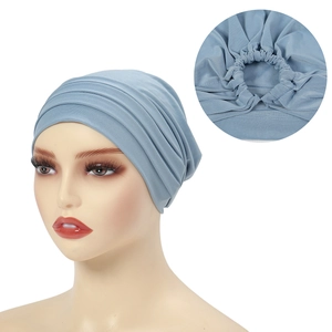 Light blue turbans for women featuring elastic back design and ribbed texture detailing