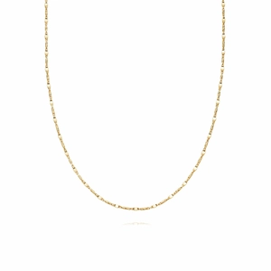 Detailed close-up of golden multi-layer beaded necklace chain with twisted metal texture