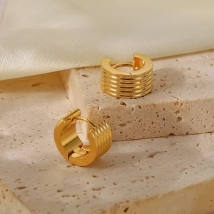 Fashionable 18K gold plated wide ribbed stainless steel hoop earrings on stone