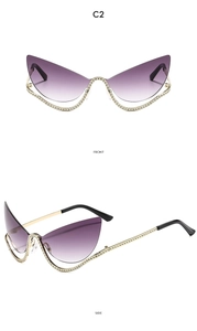 Detail of cat-eye sunglasses with purple gradient lenses and rhinestone-encrusted gold frame