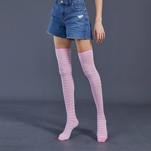 Detail shot of stretch fit over-the-knee socks with pink and grey horizontal stripes