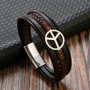 Detailed close-up of dark brown multi-layer braided leather bracelet with peace sign charm