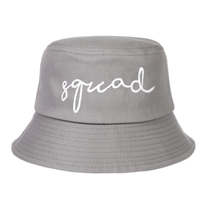 Close-up of white squad script embroidery on gray cotton twill baseball cap with neat stitching