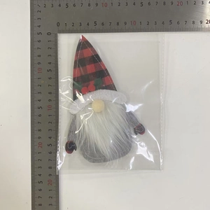Detail view of a Christmas gnome doll measuring approximately 19cm in height