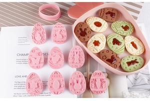 Easter egg cookie cutter set with 10 pink 3D embossing stamps for DIY festive baking