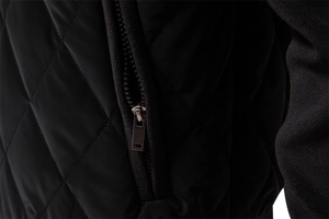 Detail of black diamond quilted jacket with zip pocket and warm fleece lining