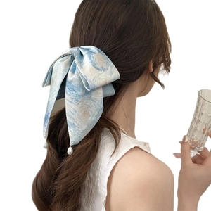 Blue starry sky oil painting style bow hair tie with pearl pendant on high silk texture
