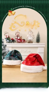 Detail of red and green plush Christmas hats with gold star patterns in a festive setting