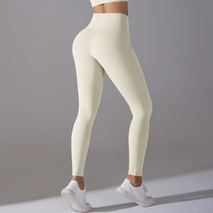 Close-up of high-waisted seamless yoga pants in cream with professional butt-lifting seams