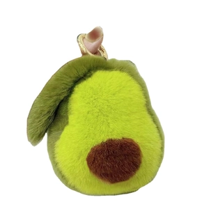 Cute plush avocado keychain made of real rabbit fur with a metal ring on white background