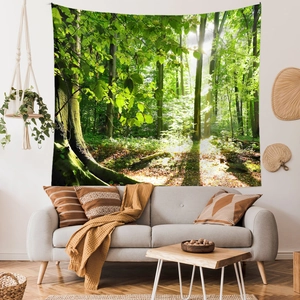 Detailed view of large forest tapestry with lush trees and natural sunlight on the wall