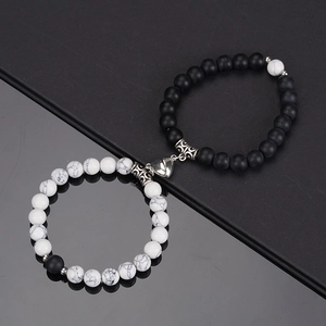 Magnetic attraction heart bracelets with black matte onyx and white marble stones for couples