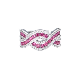 Luxurious silver intertwined ring with sparkling red ruby and white zircon gemstones