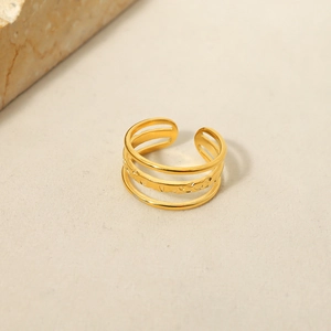Detailed view of 18K gold plated triple layered ring with textured middle band