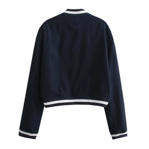 Rear view of dark baseball jacket featuring black and white striped ribbed cuffs and hem