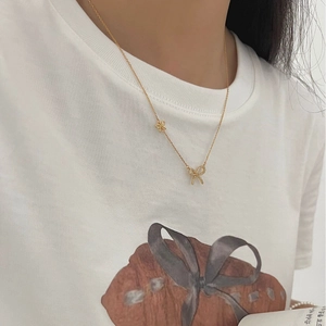 925 silver golden necklace featuring sparkling double bow pendants on a delicate chain