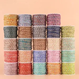 Assorted colorful metallic cotton cord spools for DIY jewelry and braided craft projects