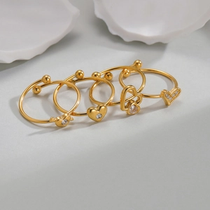 Elegant gold heart-shaped adjustable stainless steel rings set with sparkling crystals