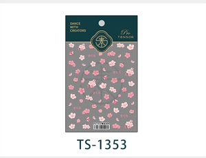 Detail showing pink cherry blossom nail art stickers with delicate gold foil stamping