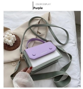 Detailed view of tricolor patchwork crossbody bag in purple, white and sage green leather