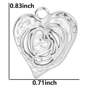 Macro shot of a stainless steel heart pendant with size dimensions 0.83 x 0.71 inch