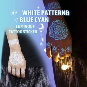 Tatuaggi temporanei mandala bianchi con effetto luminoso blu ciano per la notte