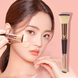 Double-ended foundation brush with flat and angled bristles for seamless makeup application