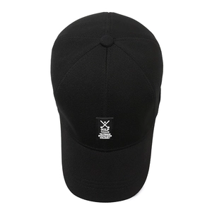 Minimalist black quick-dry baseball cap with golf emblem and breathable knit texture