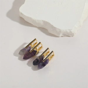 Luxurious gold earrings featuring black cubic zirconia and purple amethyst stone drops