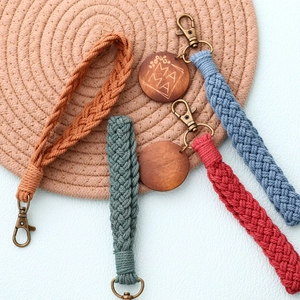 Handmade bohemian braided wristlet keychains in assorted colors with mama wood pendant