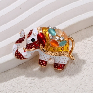 Vintage elephant brooch in gold finish with colorful enamel and inlaid gemstones