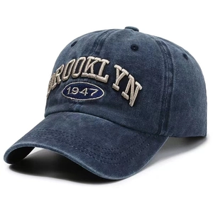Retro washed denim baseball cap with 3D Brooklyn 1947 embroidery in a 45-degree side view