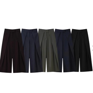 Pantalon femme taille haute à jambes larges avec design plissé frontal en plusieurs couleurs