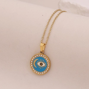 Gold star and moon stainless steel pendant necklace with blue enamel evil eye and crystals