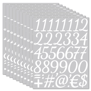 Close-up of 10 sheets of waterproof white vinyl number and symbol stickers on grey base
