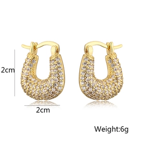 Detail view of gold U-shaped hoop earrings with pave-set zircons, size 2cm by 2cm and 6g