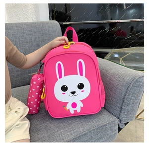 Detail of rose red kids backpack with cute cartoon rabbit print and matching pencil case
