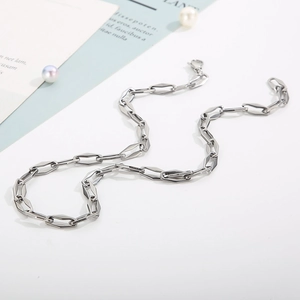 Minimalist silver stainless steel chain necklace with geometric rhombic links and clasp