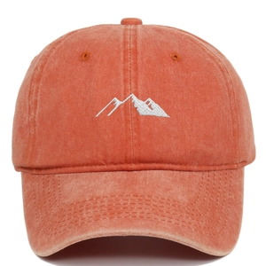 Detail of vintage washed cotton baseball cap with white mountain peak embroidery