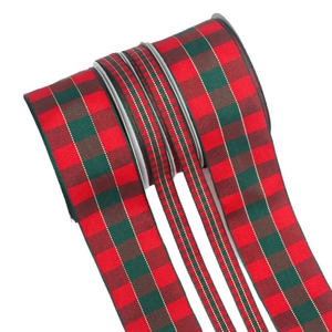 Red and green tartan Christmas plaid ribbon rolls for festive DIY gift wrapping