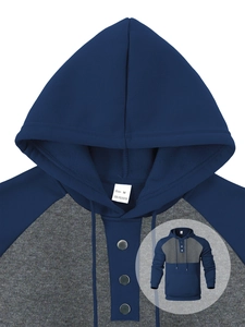 Detail of navy and grey hooded sweatshirt showing size M tag and 100% polyester fabric texture
