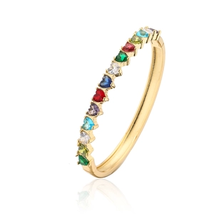 Close-up of 18K gold plated bangle featuring twelve multi-colored heart-shaped zircons
