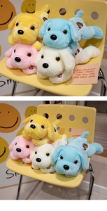 Detailed view of plush glowing puppy toy dogs in yellow, blue, pink, and white colors
