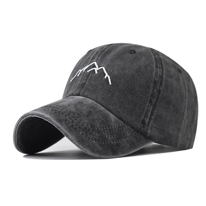 Washed cotton baseball cap with mountain embroidery and vintage distressed finish