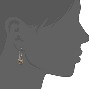 Gothic punk skull drop earrings with crown and black white crystals on model