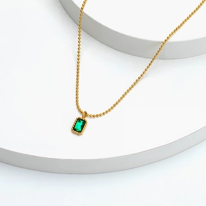 Minimalist 18k gold plated stainless steel necklace with emerald green zircon pendant