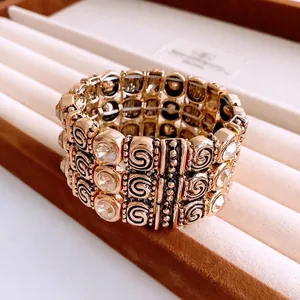 Vintage Wide Elastic Bracelet Gold Tone Alloy Rhinestone Scroll Relief Bohemian Bangle For Women Retro Jewelry
