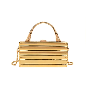 Chic gold acrylic box clutch with wavy texture, metal handle and chain strap for evening events