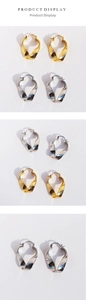 Detail showing twisted irregular geometric hoop earrings in polished gold and silver finishes