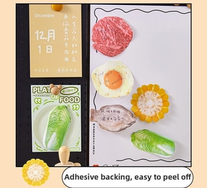 Realistic food-shaped sticky notes featuring cabbage and egg on a pegboard setup